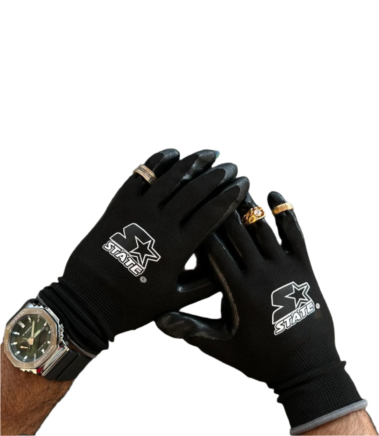 A pair of black work gloves with a visible logo on the back, worn by a person against a concrete background.